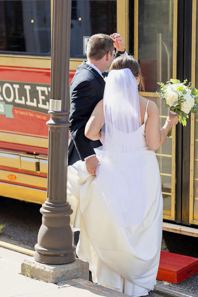 Bride and groom enter Council Grove Trolley