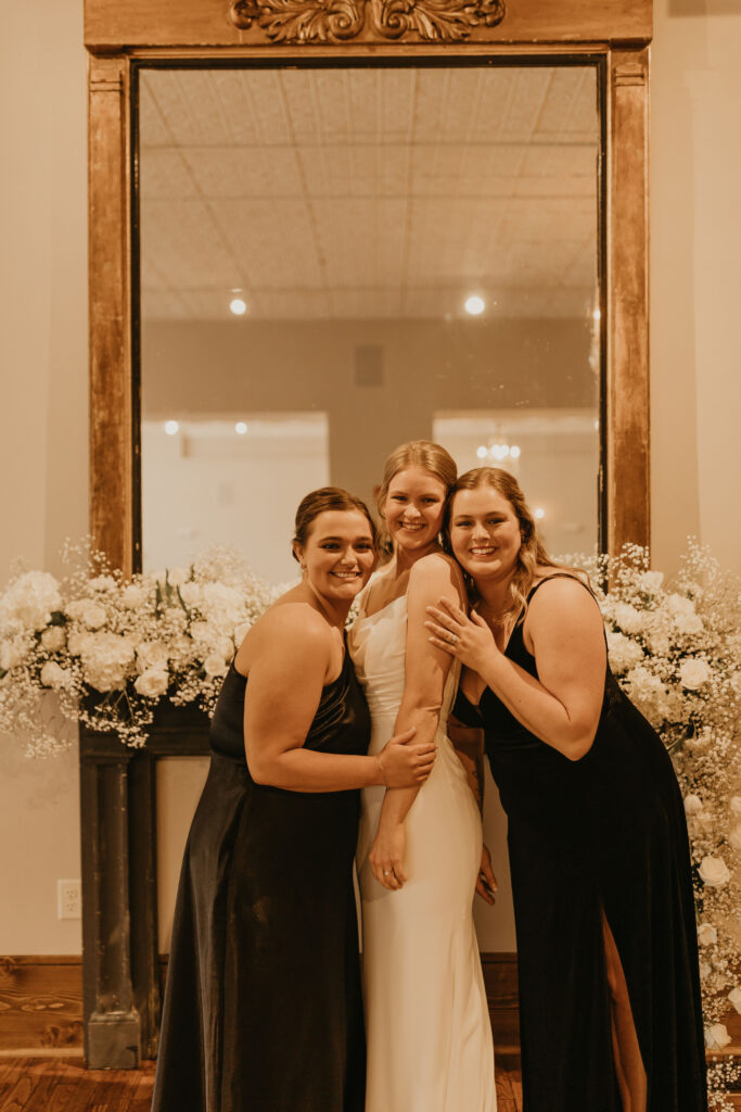 Bride and bridesmaids at Kansas Flint Hills wedding venue
