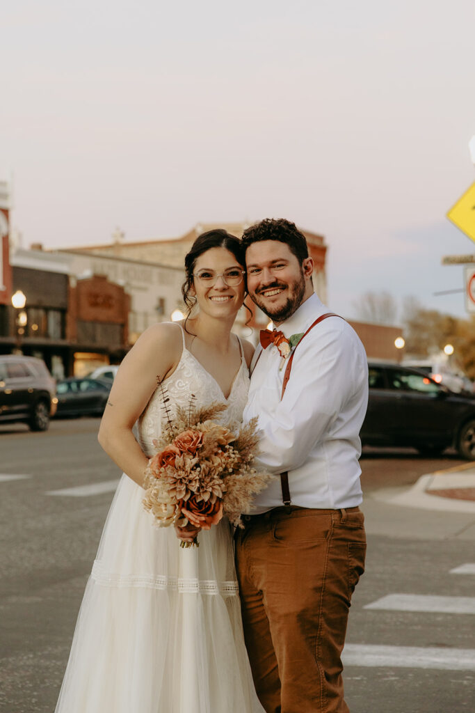 Kansas wedding couple on Main Street Council Grove, KS
